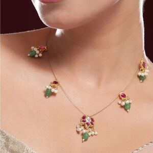 Elegant Gold and Green Necklace with Pearl Accents